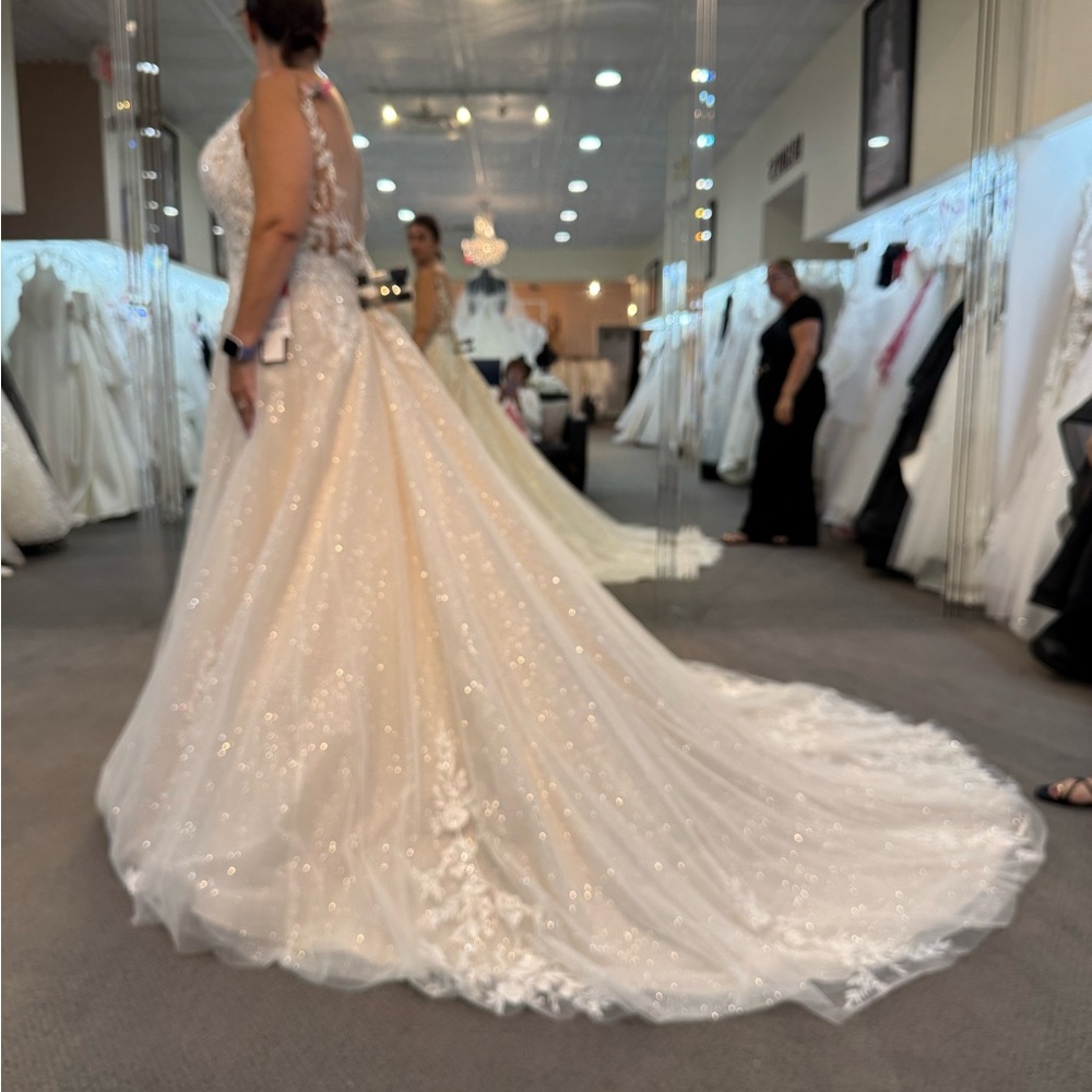 Elegant White Wedding Gown with Train